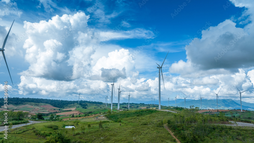 Wind Turbines Windmill Energy Farm, Windmill on blue sky puffy clouds Alternative energy sources. Re