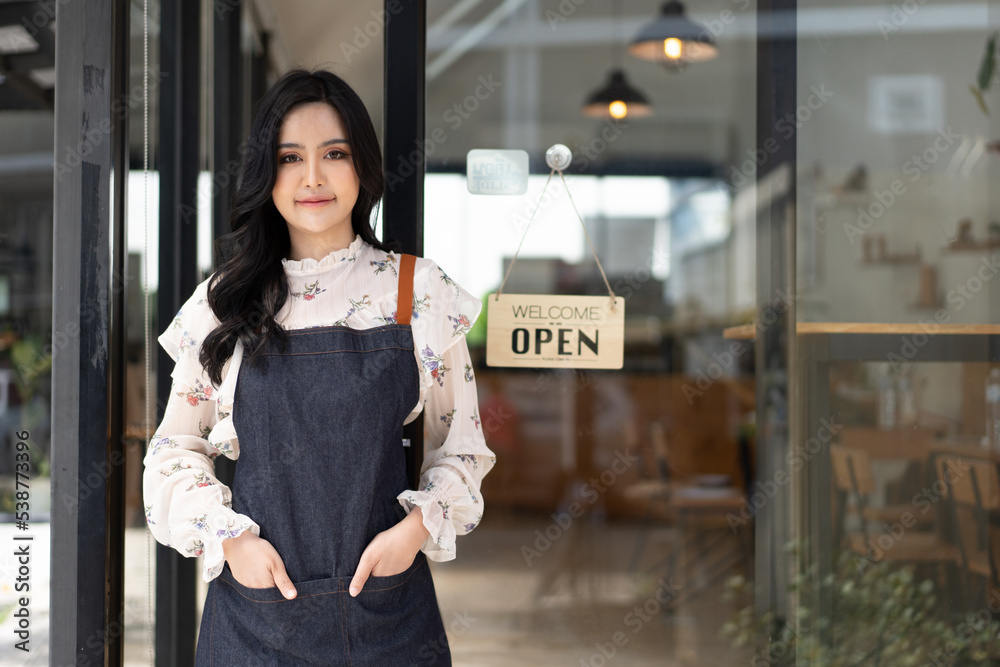 Portrait of asian woman barista cafe owner. SME entrepreneur seller business concept