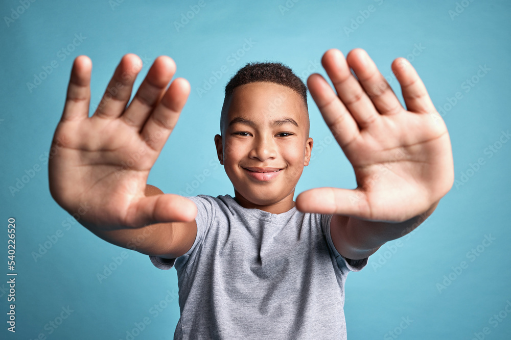 .Frame, photographer and hands portrait of child with satisfied smile for creative expression. Inspi