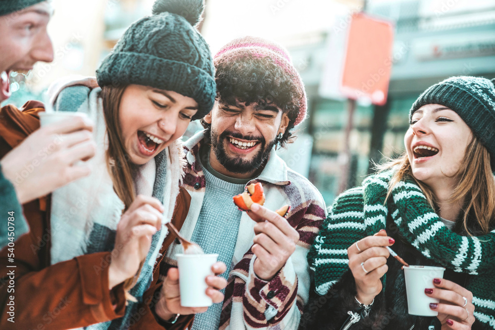 Cheerful young people enjoying winter holidays on weekend vacation