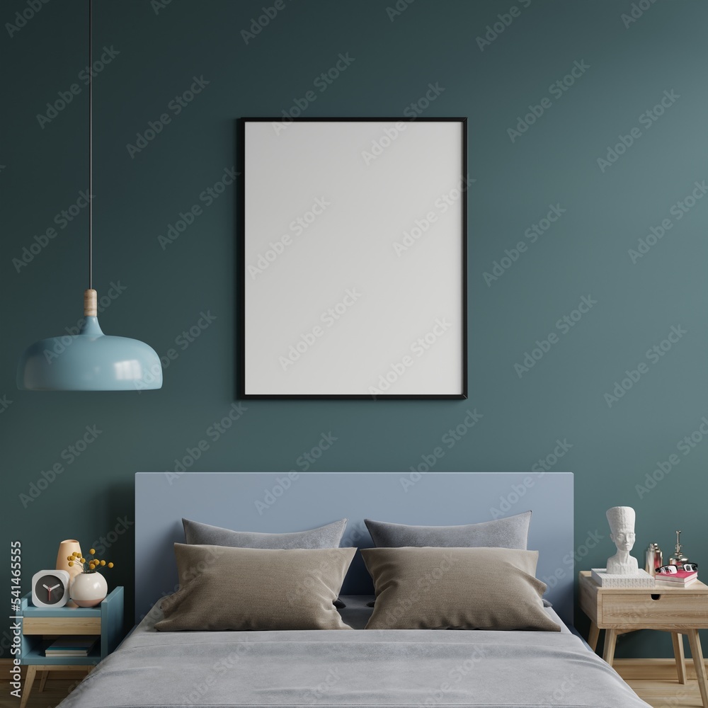 Poster mockup with vertical frames on empty dark green wall in bedroom interior.