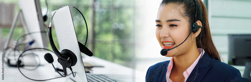 Business people wearing headset working in office in widen view to support remote customer or collea