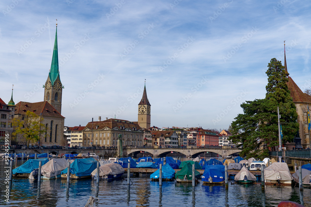 Skyline of the old town of City of Zürich with churches Womens Minster and St. Peter and Limmat Riv