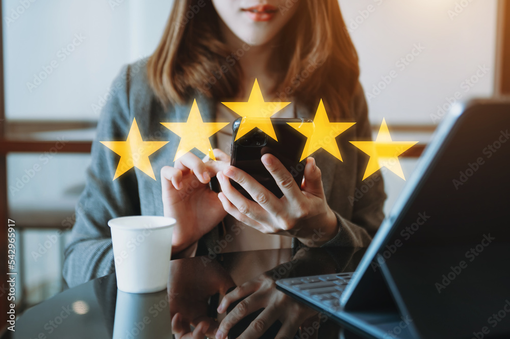 Customer or client the stars to complete five stars. with copy space. giving a five star rating. Ser