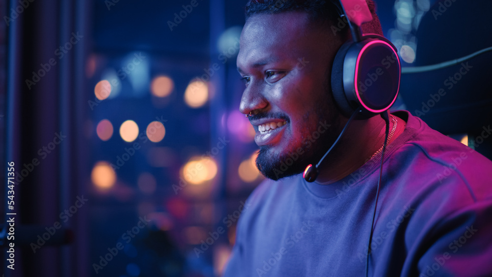 Professional Black Gamer Playing Online Video Game on Computer. Close Up Portrait of Young Man in He