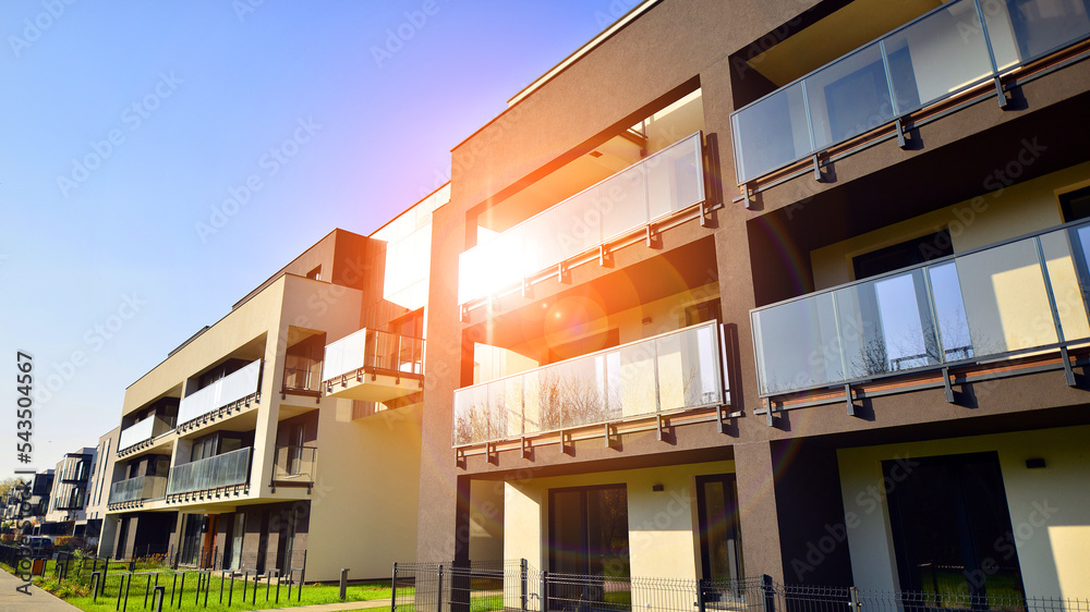 New apartment building on a sunny day. Modern residential architecture. The apartment is waiting for