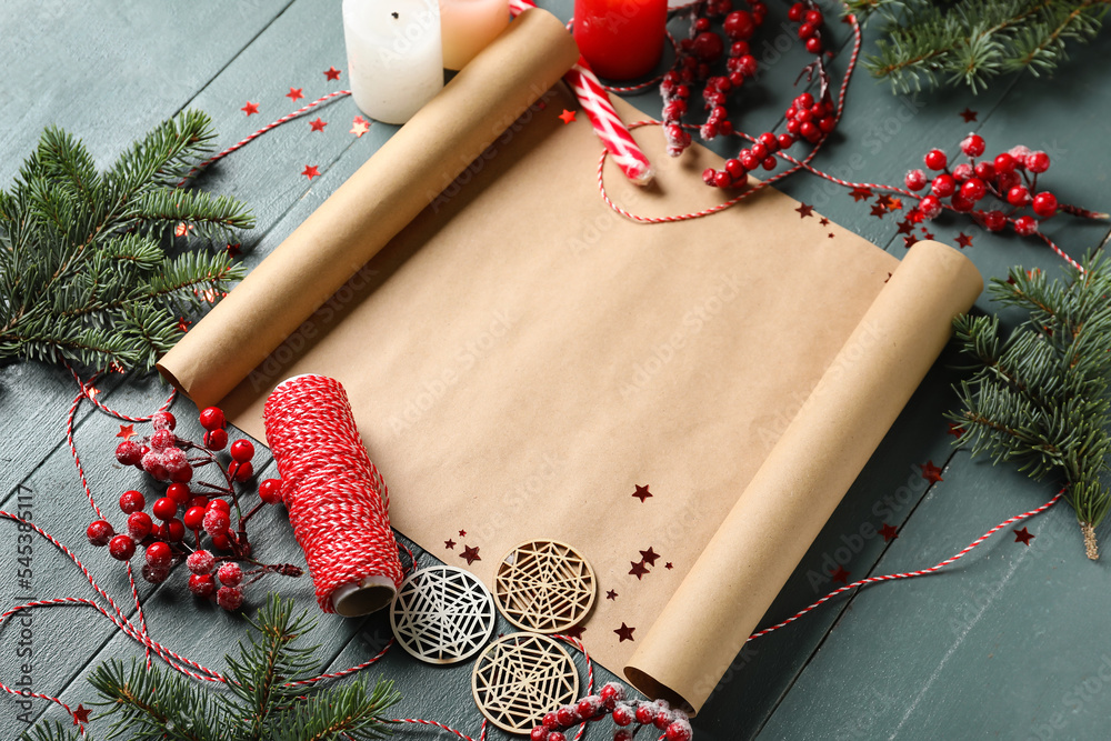 Composition with blank letter to Santa, fir branches and Christmas decor on color wooden background