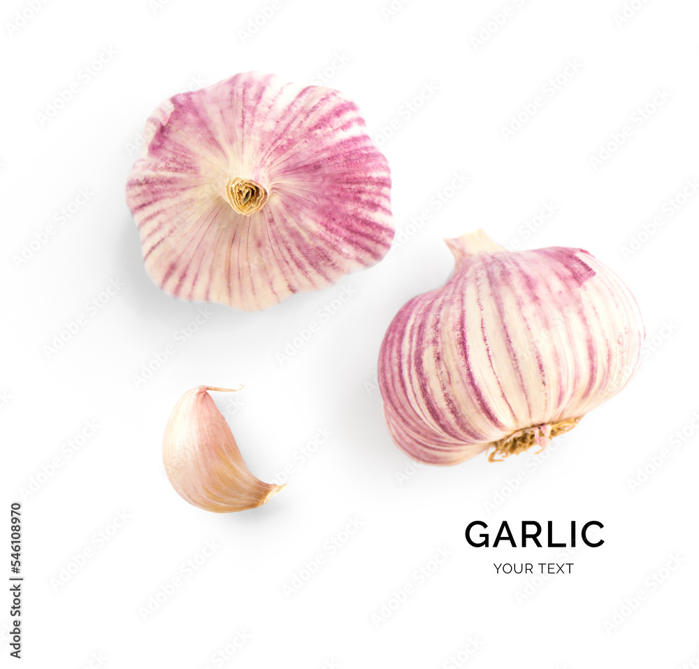 Creative layout made of garlic. Flat lay. Food concept. Garlic on the white background.