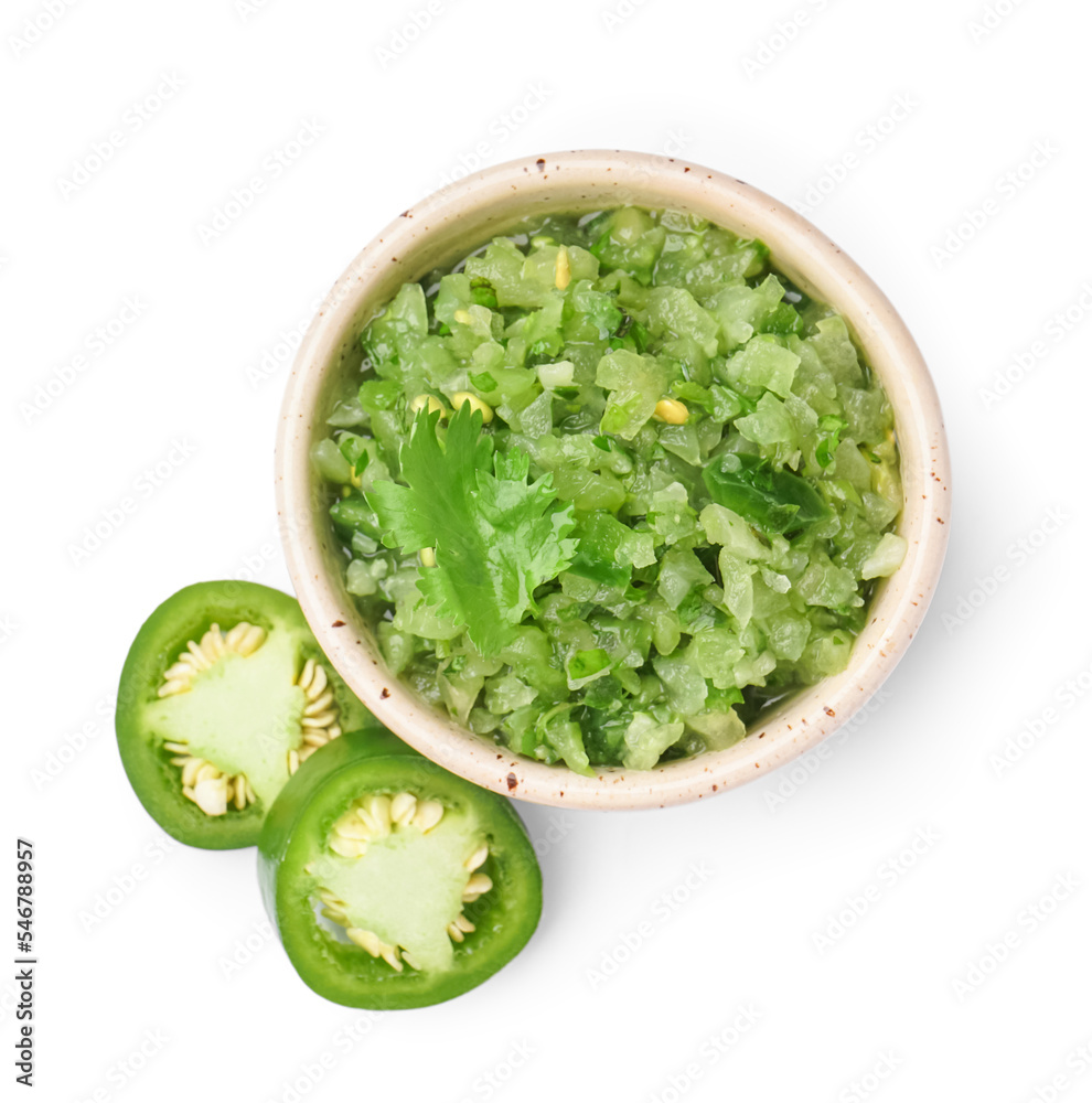 Bowl of delicious green salsa sauce on white background