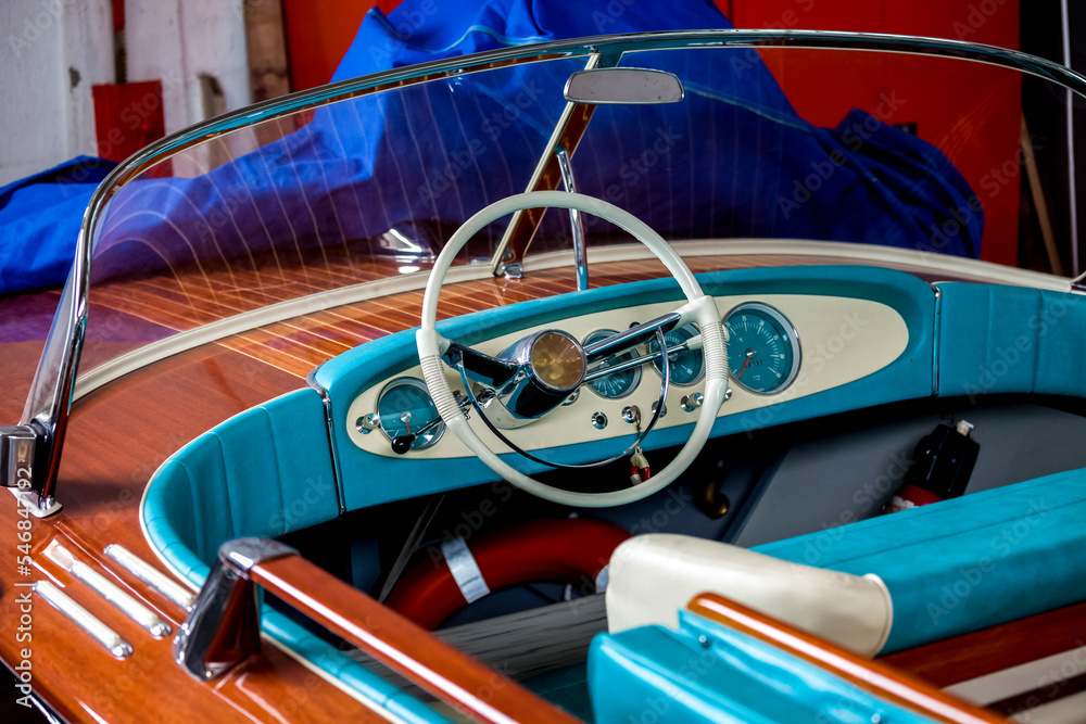 Vinage wooden motor boat dashboard in shipyard