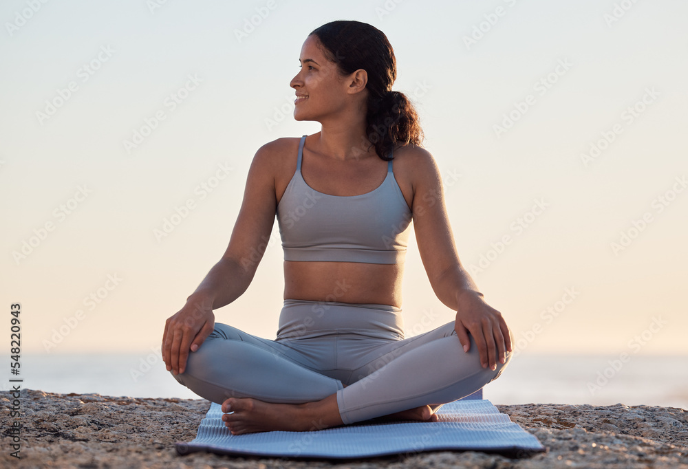 Yoga, meditation or zen exercise black woman relax on yoga mat at beach, sea or ocean for motivation