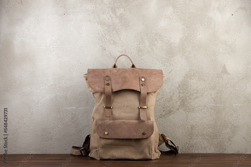 Back to school - school backpack on the desk in the auditorium, Education concept.