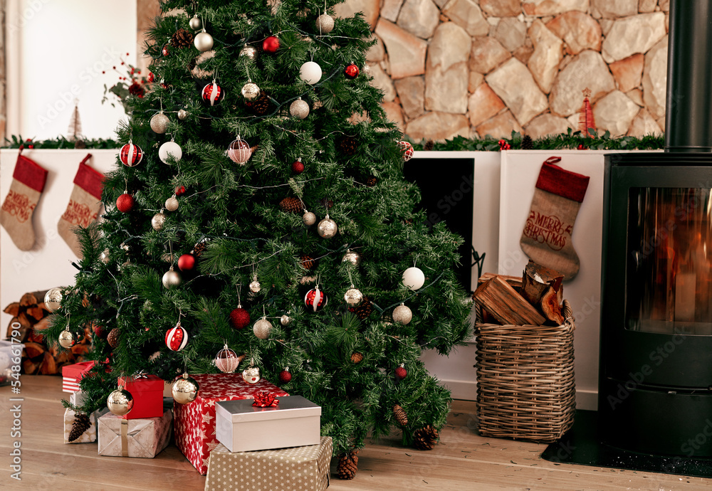 Christmas tree, present and holiday living room in winter with house decoration and gifts. Home gift