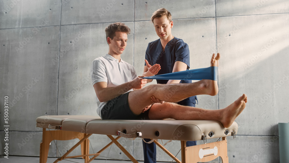 Sport Physiotherapy Specialist Showing How to Stretch a Rubber Band on Specific Muscle Groups or Joi