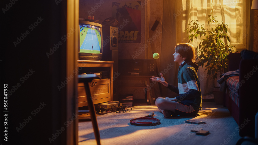 Young Sports Fan Watches a Tennis Match on TV at Home. Handsome Boy Supporting His Favorite Player, 