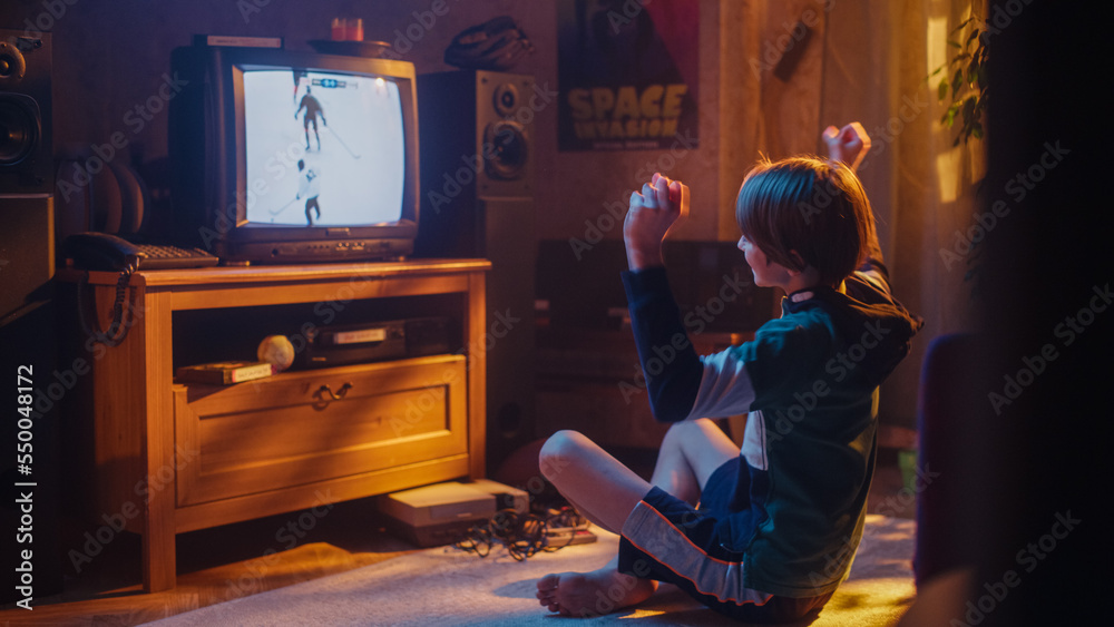 Nostalgic Retro Childhood Concept. Young Boy Watches Hockey Match on TV in His Stylish Room with Dat