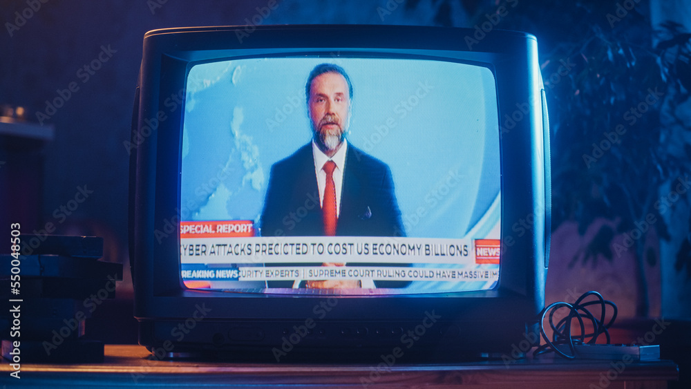 Close Up Footage of an old TV Set Screen with Breaking News Report. Handsome Middle Aged Anchorman R