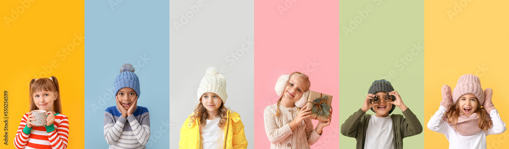 Set of cute little children in winter clothes on color background