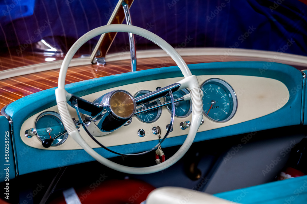 Classic wooden motor boats in shipyard