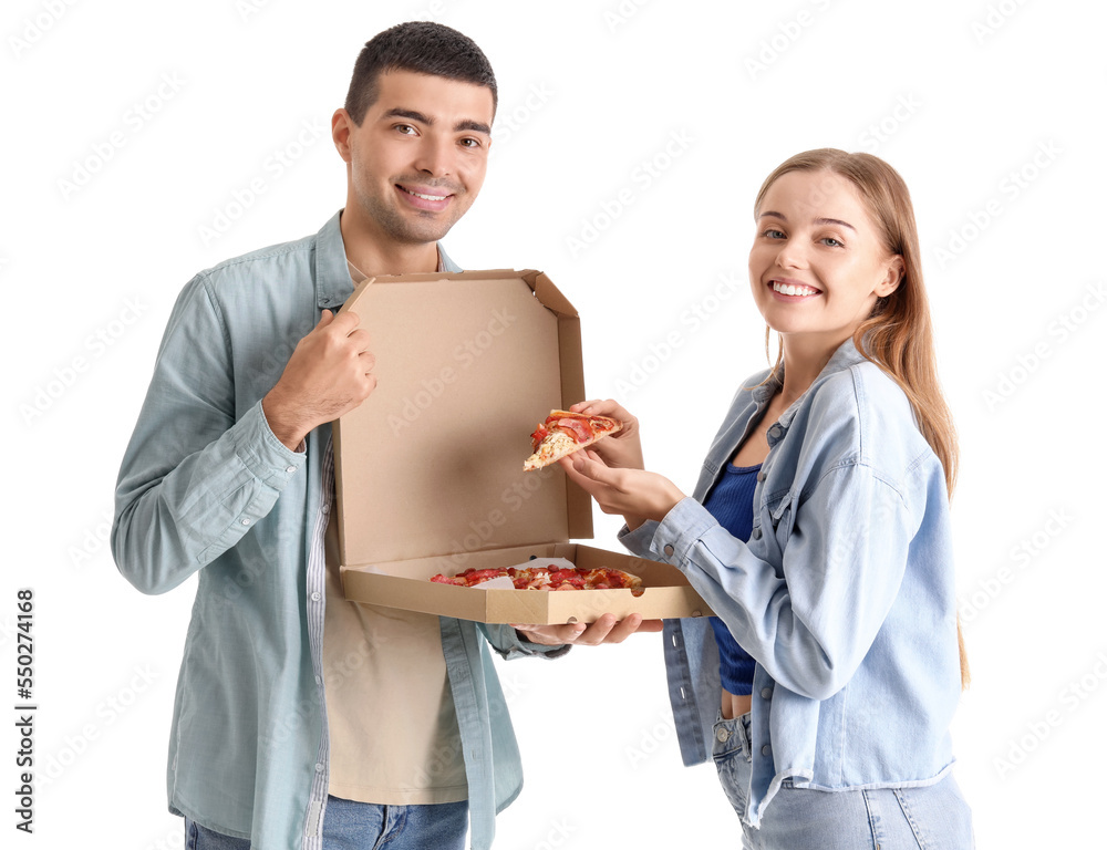 Happy young couple eating fresh pizza on white background