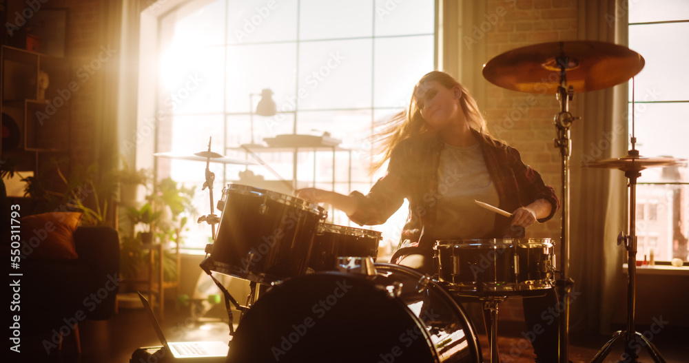 Portrait of a Beautiful Young Drummer Playing at a Band Rehearsal, Doing Tricks with Drumsticks. Lea