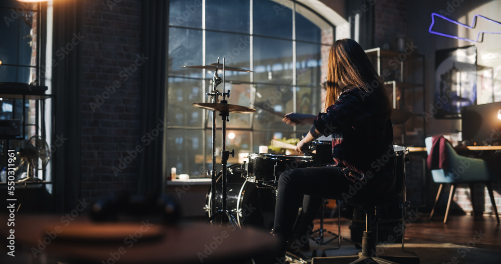 Portrait of a Young Drummer Playing at a Band Rehearsal, Doing Tricks with Drumsticks. Learning Drum