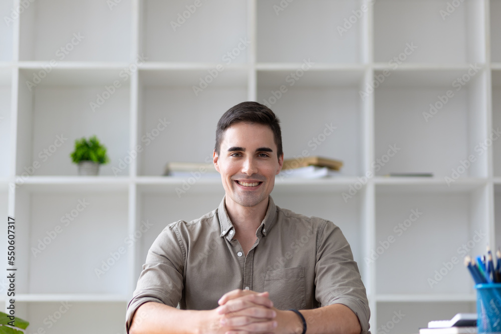 Portrait of a handsome young businessman in the office.