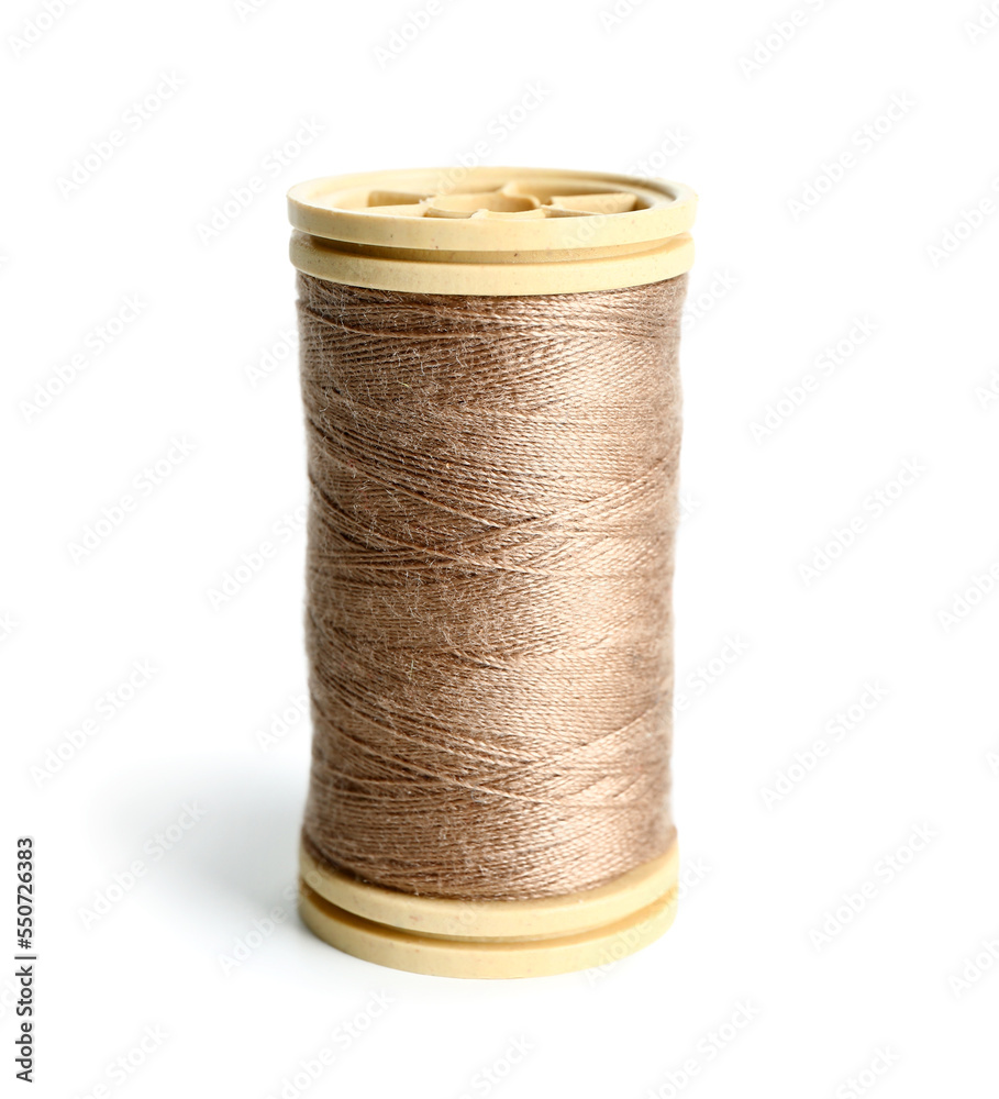 Sewing thread spool isolated on white background