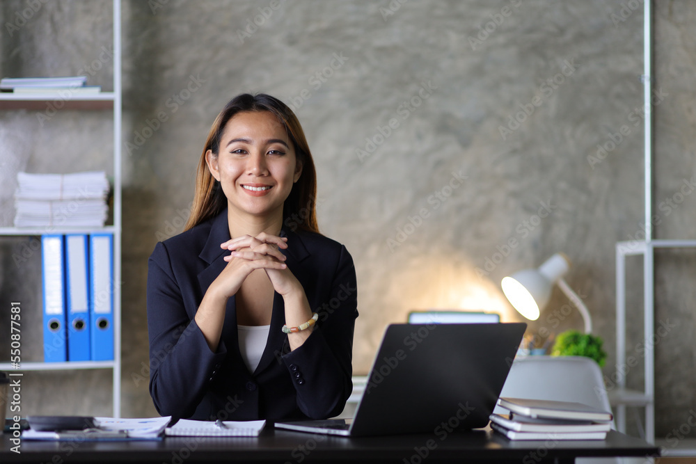 Portrait of a charming business woman in the office.