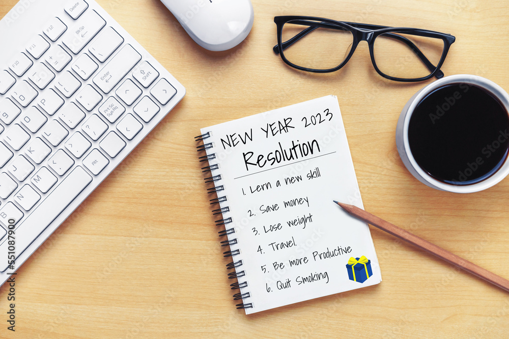 2023 Happy New Year Resolution Goal List and Plans Setting - Business office desk with notebook writ