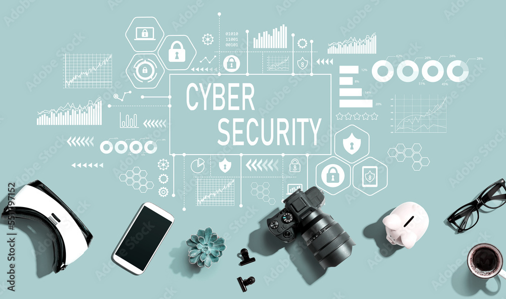 Cyber security theme with electronic gadgets and office supplies - flat lay