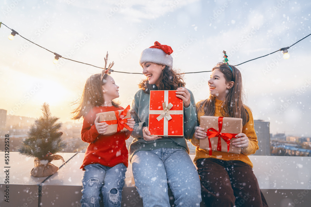 family preparing for Christmas