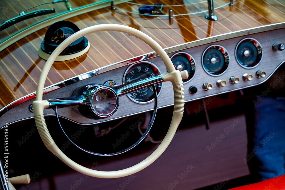 Vinage wooden motor boat dashboard in shipyard