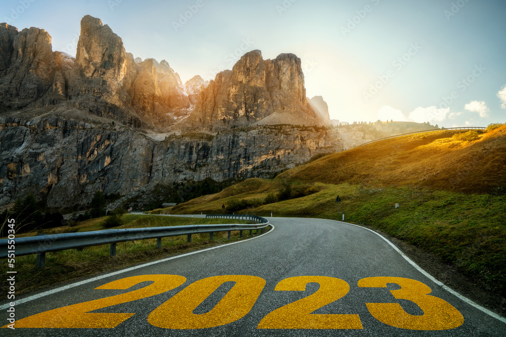 2023 New Year road trip travel and future vision concept . Nature landscape with highway road leadin