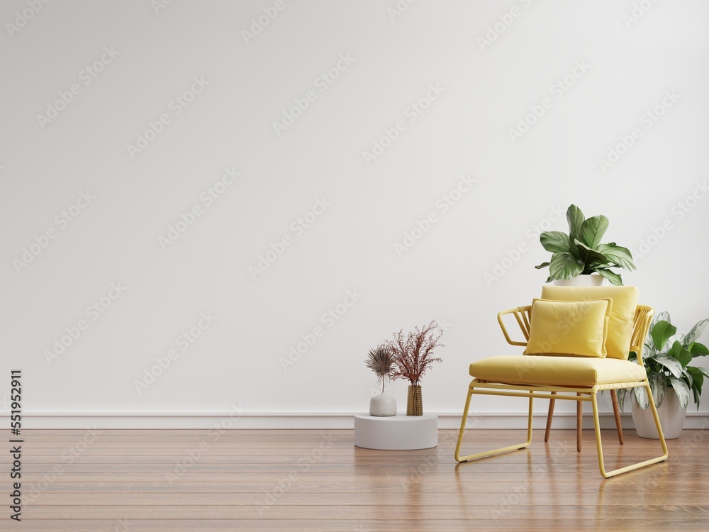 Living room has yellow armchair on empty white wall background.