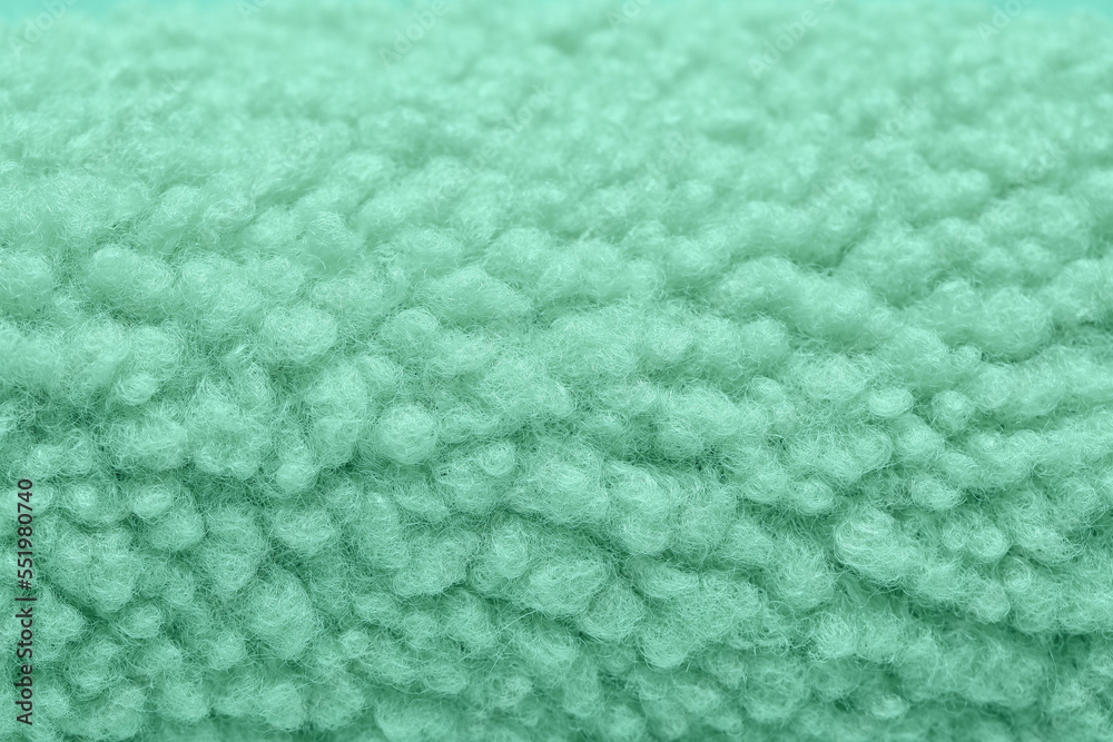 Texture of mint fluffy fabric as background