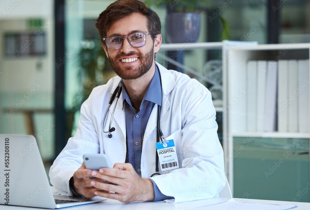 Doctor, desk and phone with smile for texting, communication or chatting and good connection at hosp