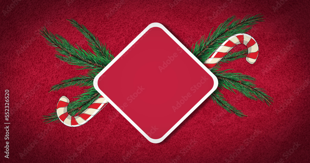 Image of candy canes and fir tree over sign with copy space on red background