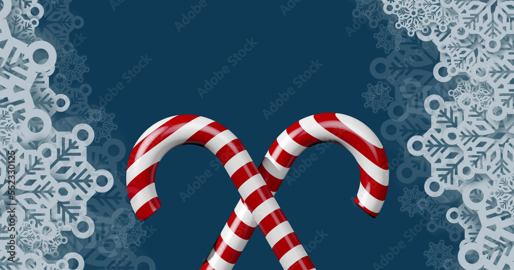 Image of christmas candies and snowflakes on navy background