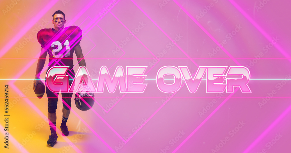 Composite of american football player with ball and helmet standing by game over text on pink lines