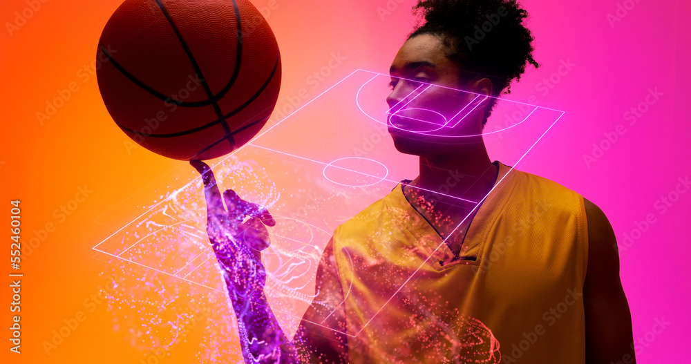 Composite of biracial male player spinning ball on finger over illuminated basketball court