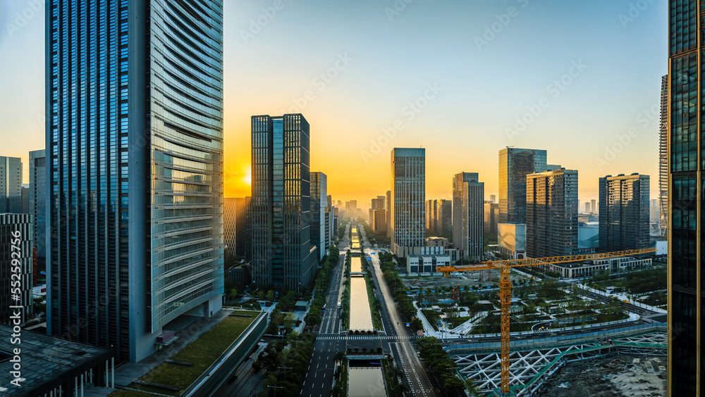 Aerial view of city skyline and modern buildings at sunrise in Ningbo, Zhejiang Province, China. Eas