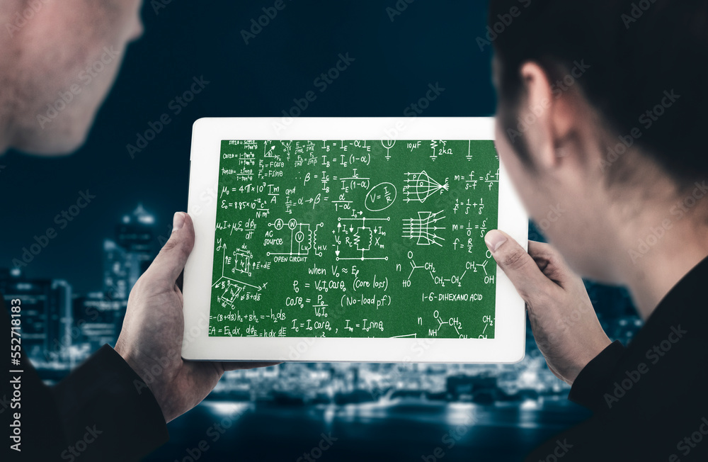 Mathematic equations and modish formula on computer screen showing concept of science and education