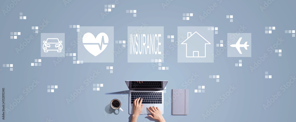 Insurance concept with person working with a laptop