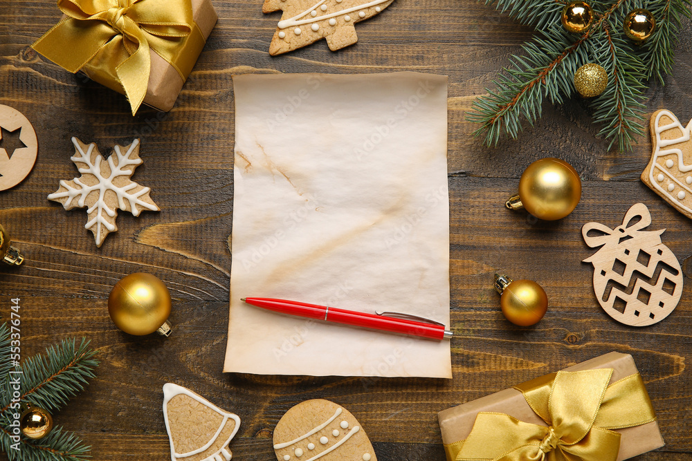 Blank letter to Santa with Christmas decor and cookies on wooden background