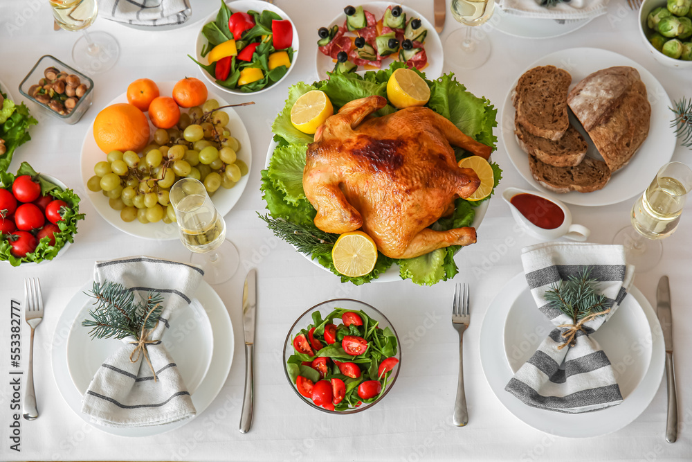 Tasty dishes for Christmas celebration on table