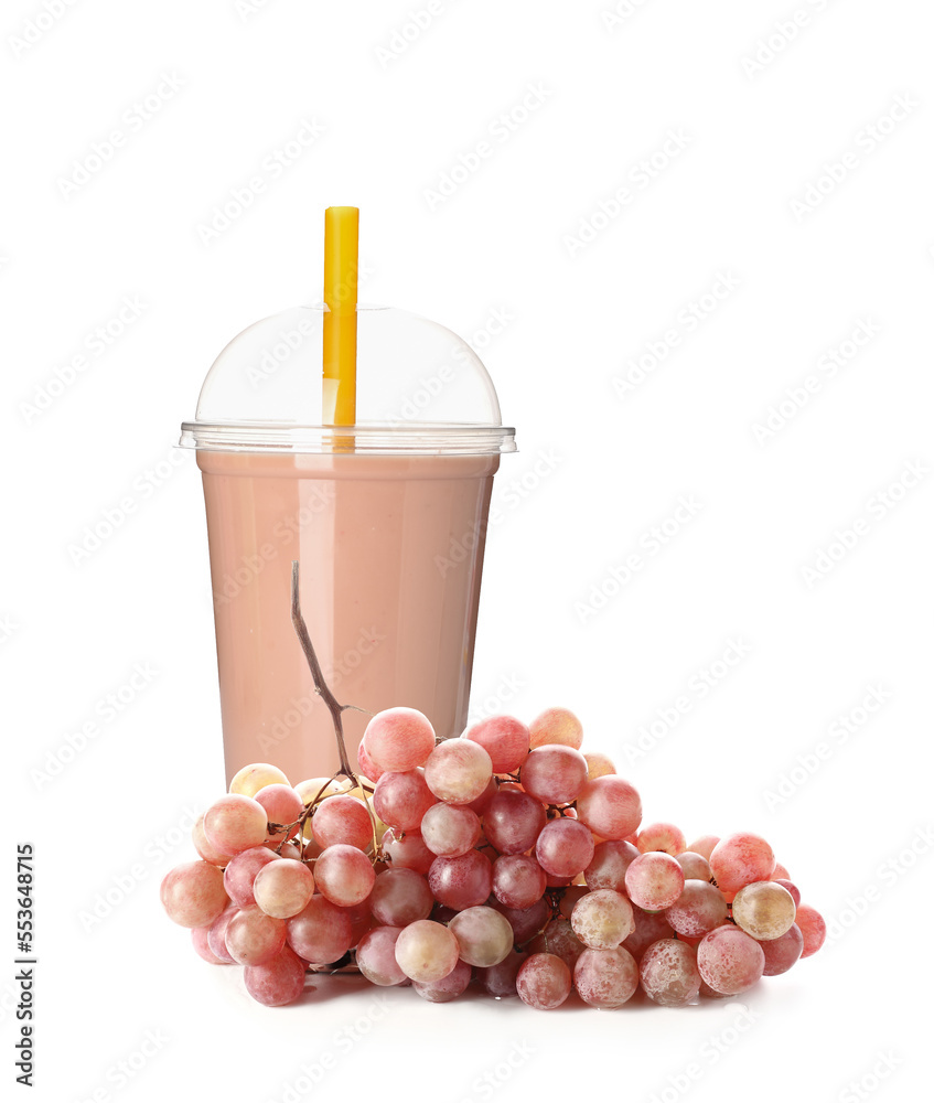 Plastic cup of tasty bubble tea with grapes on white background