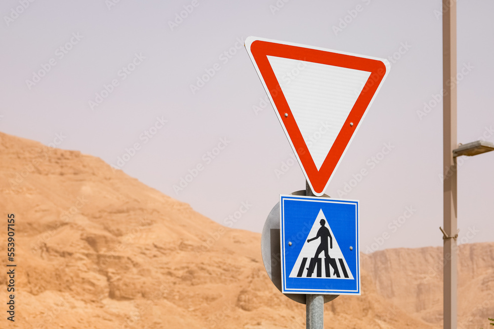 Different traffic signs in desert