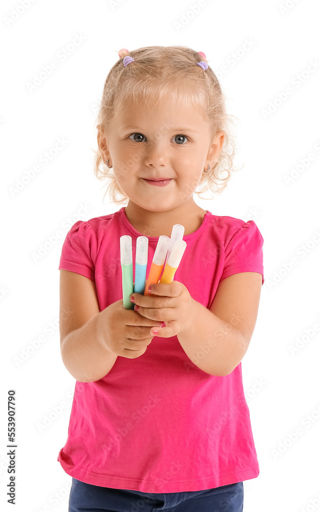 Cute little girl with felt-tip pens on white background