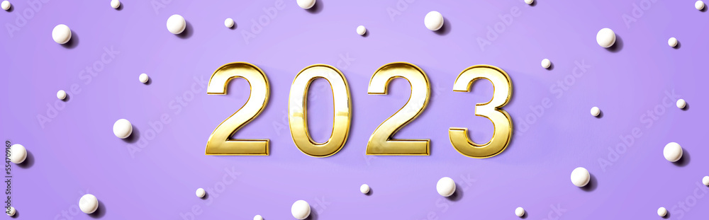 2023 new year theme with white candy dots - flat lay